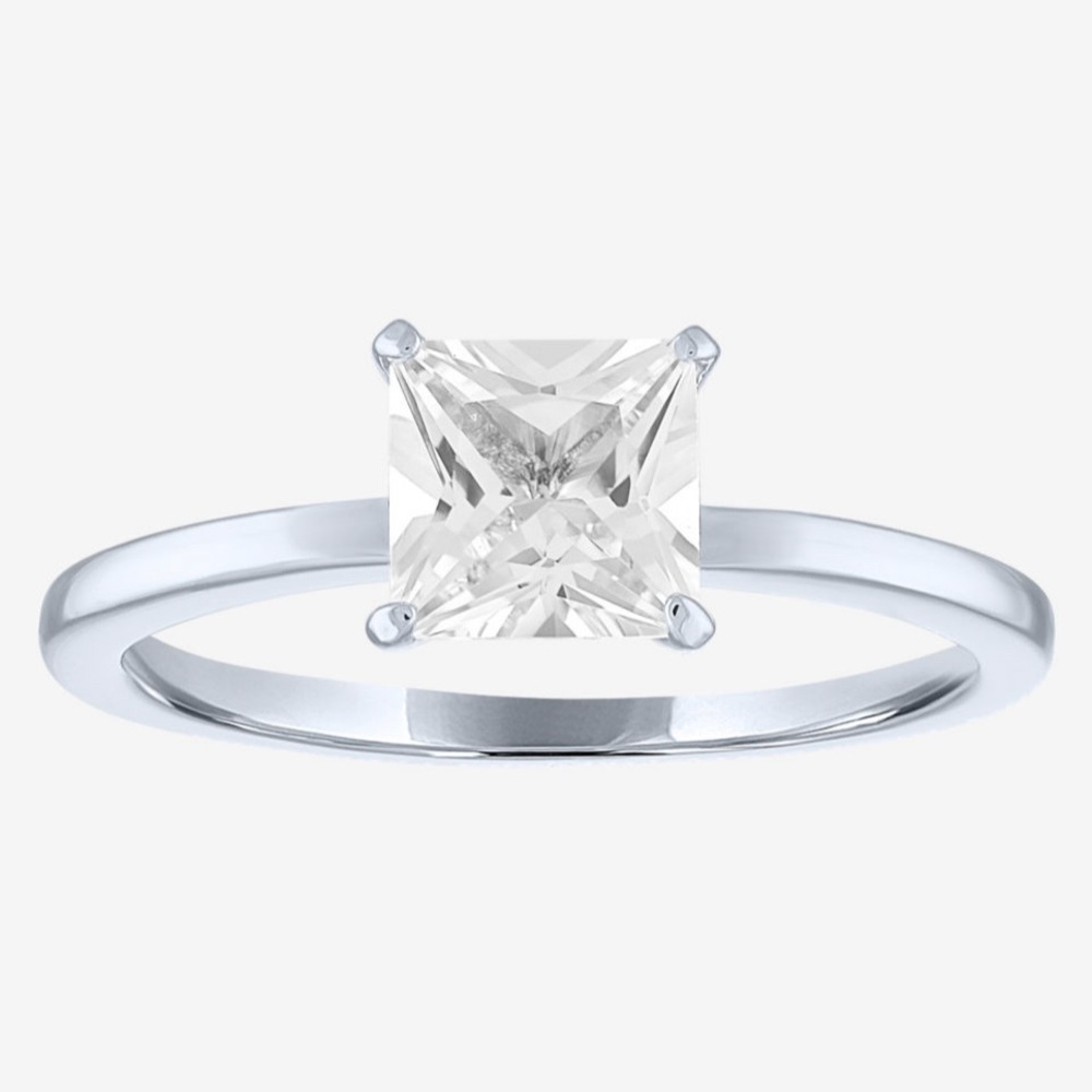 .925 Sterling Silver and Diamond Replicant. Looks like 20 grand.